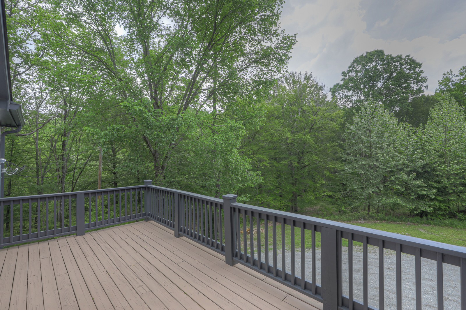1115 Ridgecrest Road Kingston Springs, TN 37082 - Photo 7 of 38 a view of a balcony with wooden floor