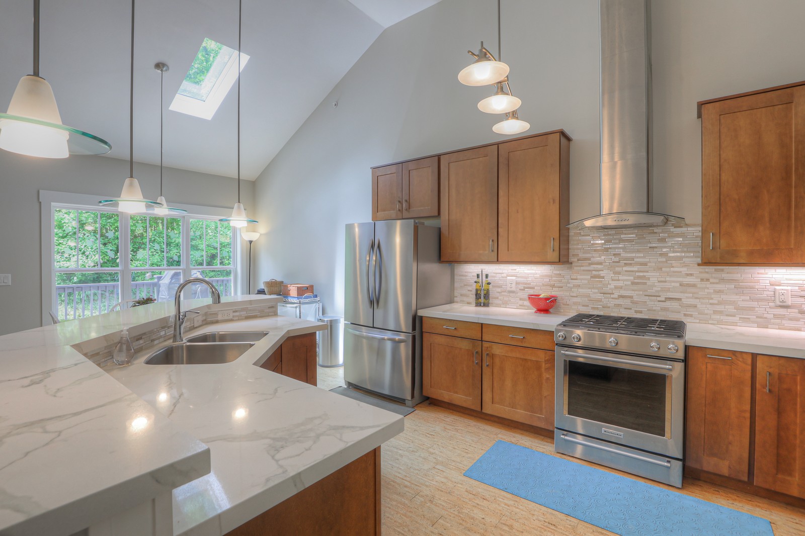 1115 Ridgecrest Road Kingston Springs, TN 37082 - Photo 10 of 38 a kitchen with stainless steel appliances granite countertop a sink a stove and a refrigerator
