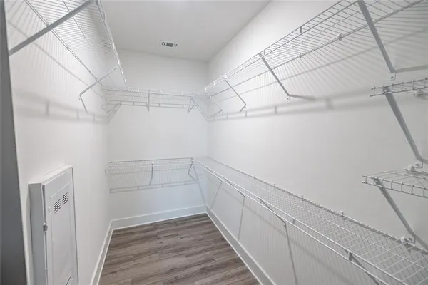 a view of a room with racks on the wall