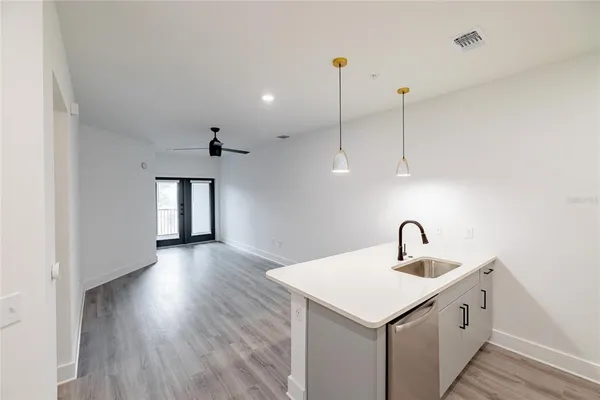 a bathroom with a sink and a large window