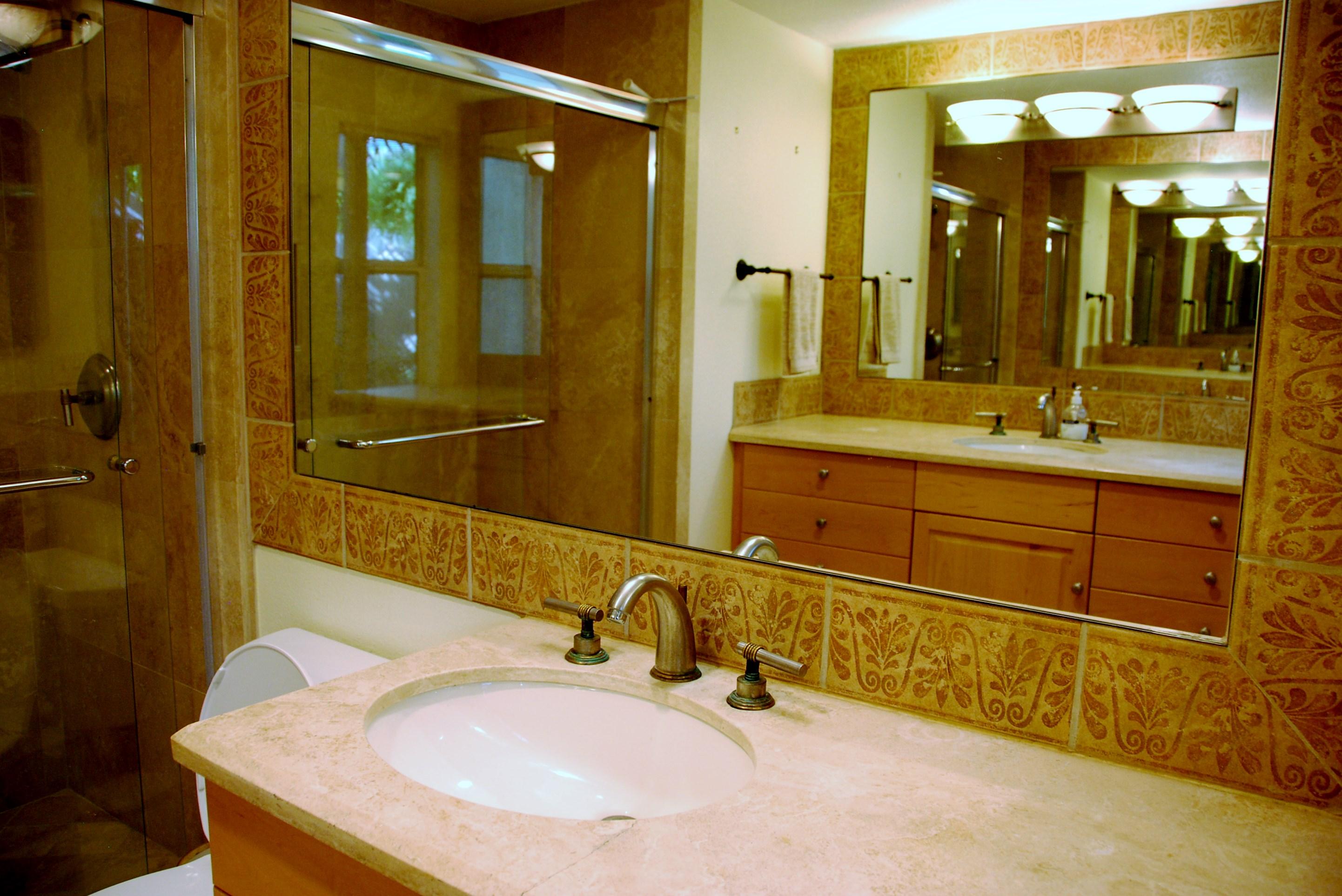71601 Gardess Road Rancho Mirage, CA 92270 - Photo 13 of 17 a bathroom with a sink and a mirror
