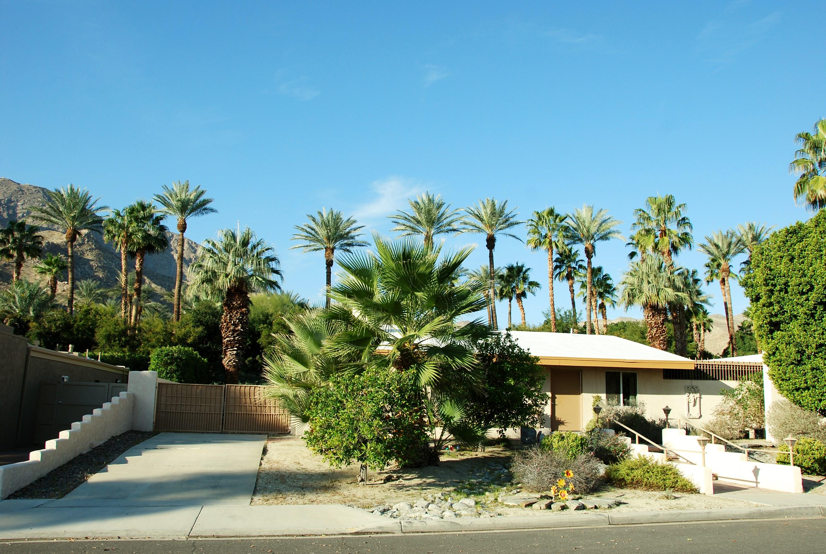 71601 Gardess Road Rancho Mirage, CA 92270 - Photo 7 of 17 a view of a patio with table and chairs potted plants