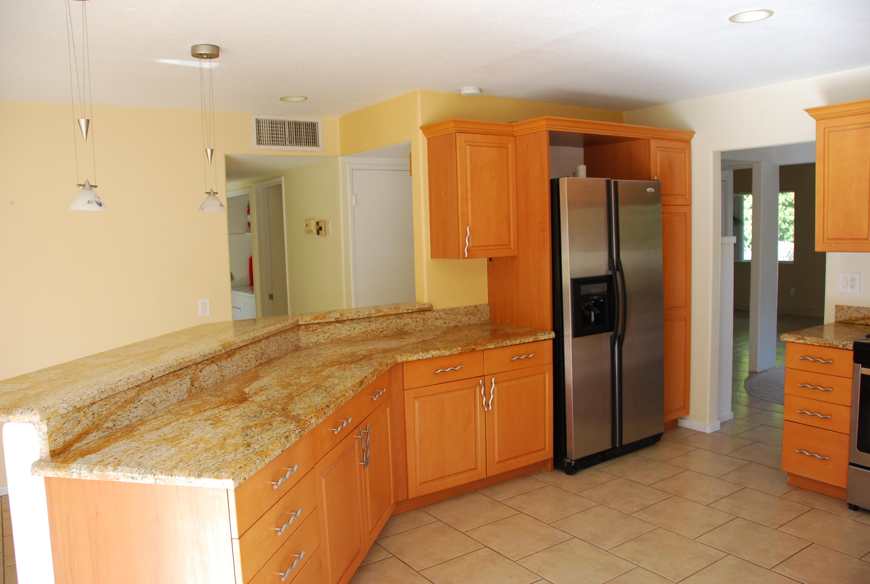71601 Gardess Road Rancho Mirage, CA 92270 - Photo 8 of 17 a bathroom with a granite countertop sink and a mirror
