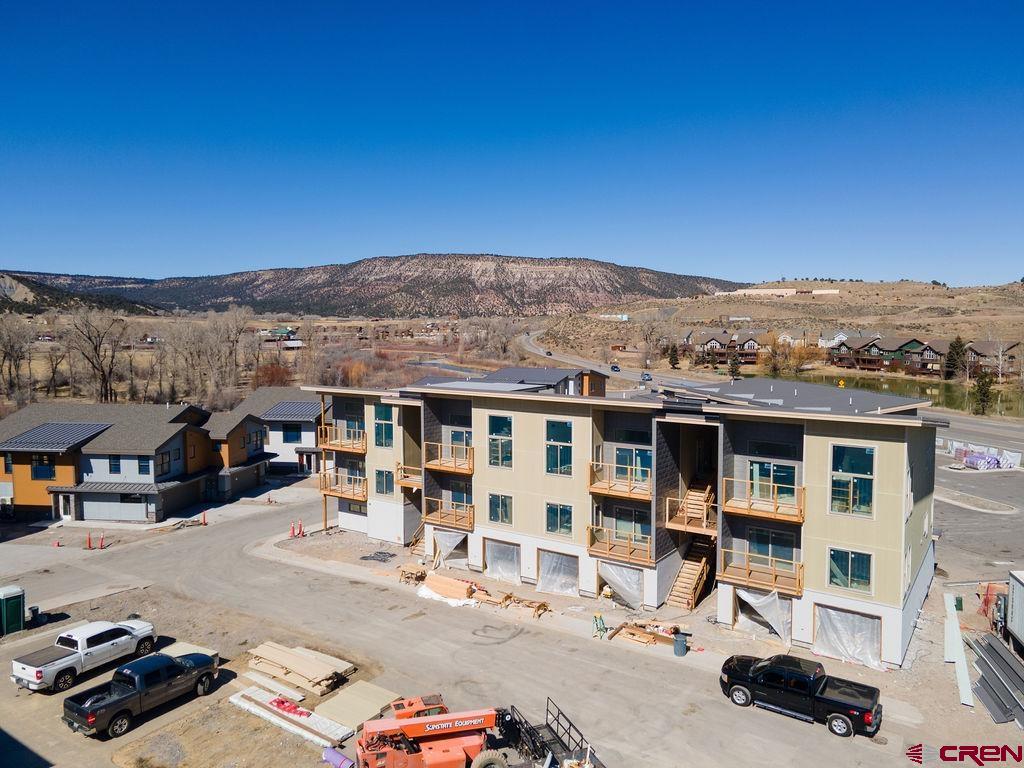 199 Riverfront Lane, Unit 201 Ridgway, CO 81432 - Photo 19 of 22 a view of a terrace with a lounge chair