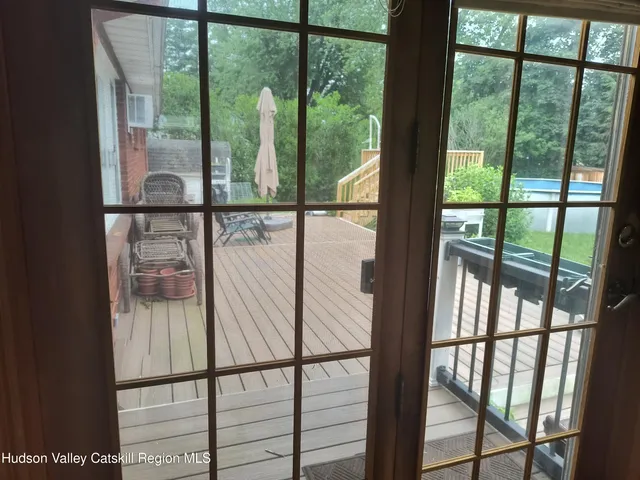 a view of house with patio outdoor seating