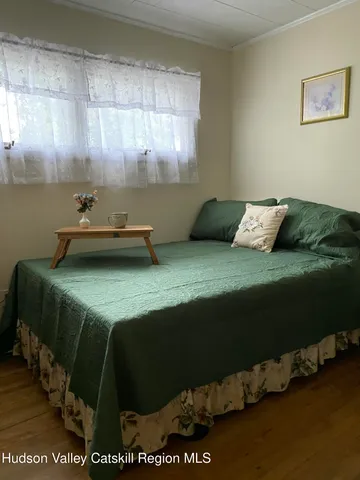 a picture of water heater room with furniture