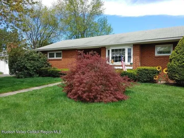 a view of a house with a garden