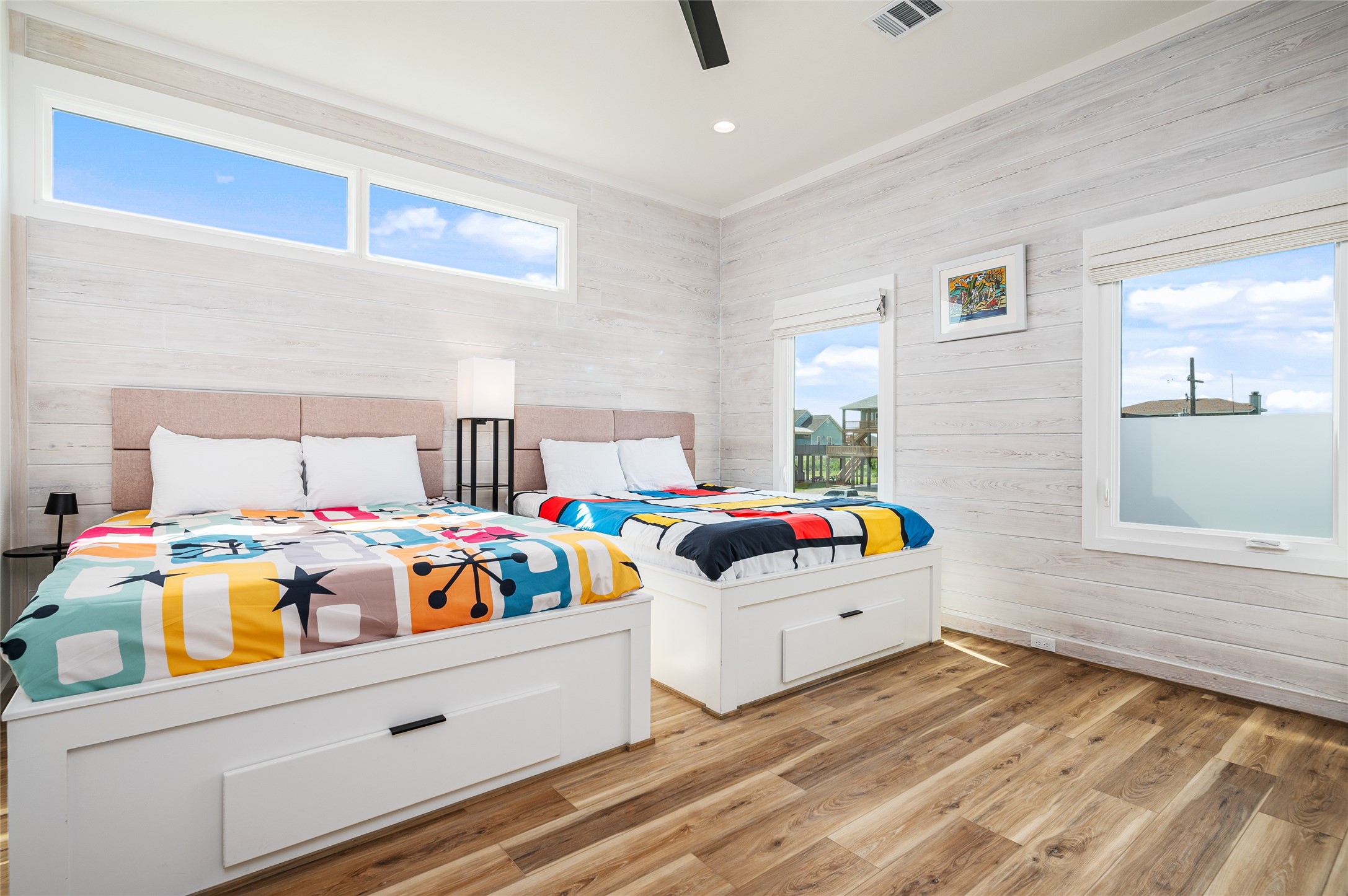 342 Atkinson Street Crystal Beach, TX 77650 - Photo 25 of 50 a very nice looking bedroom with a bed and a window