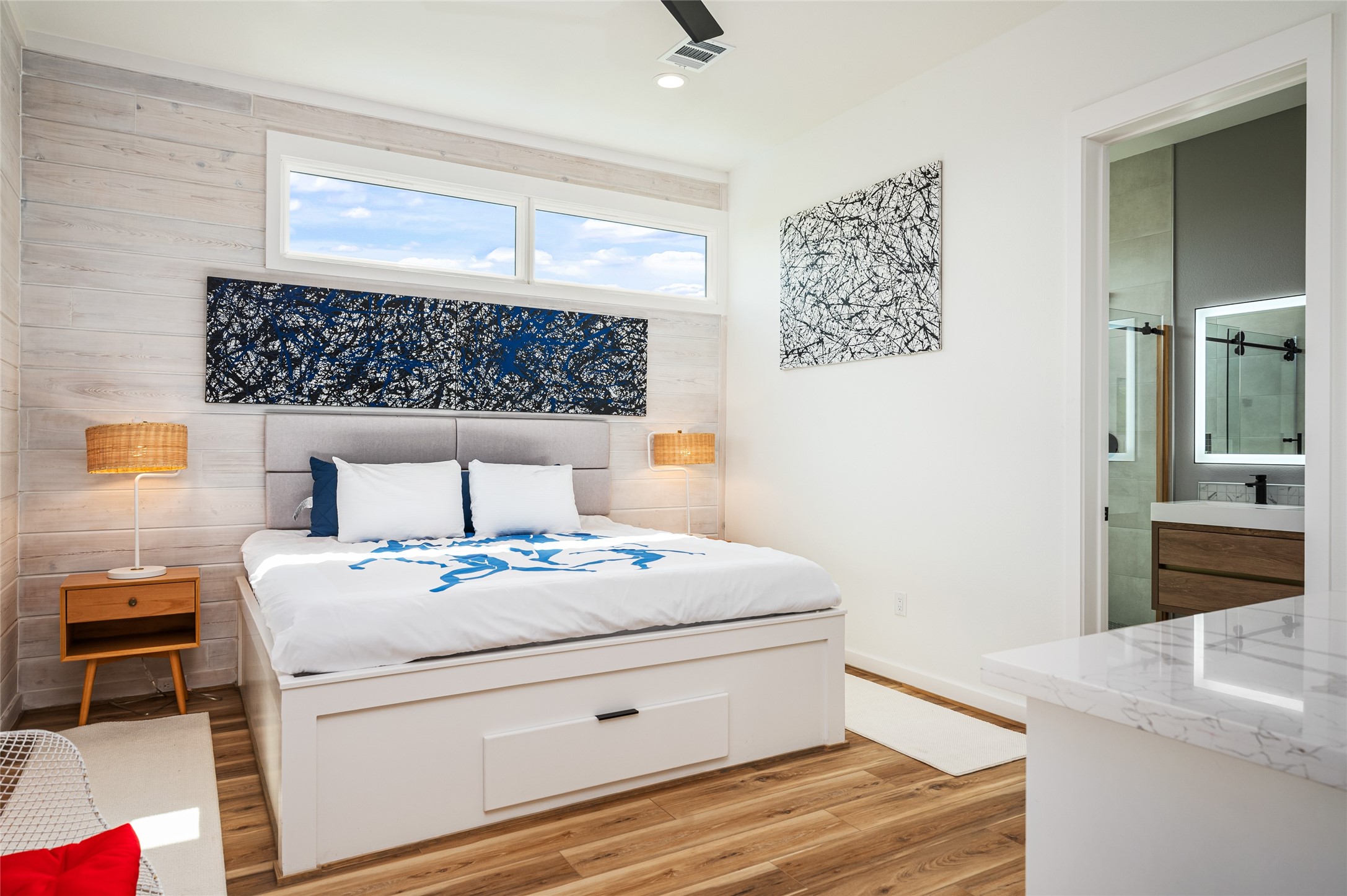 342 Atkinson Street Crystal Beach, TX 77650 - Photo 27 of 50 a bedroom with a bed and a table in it