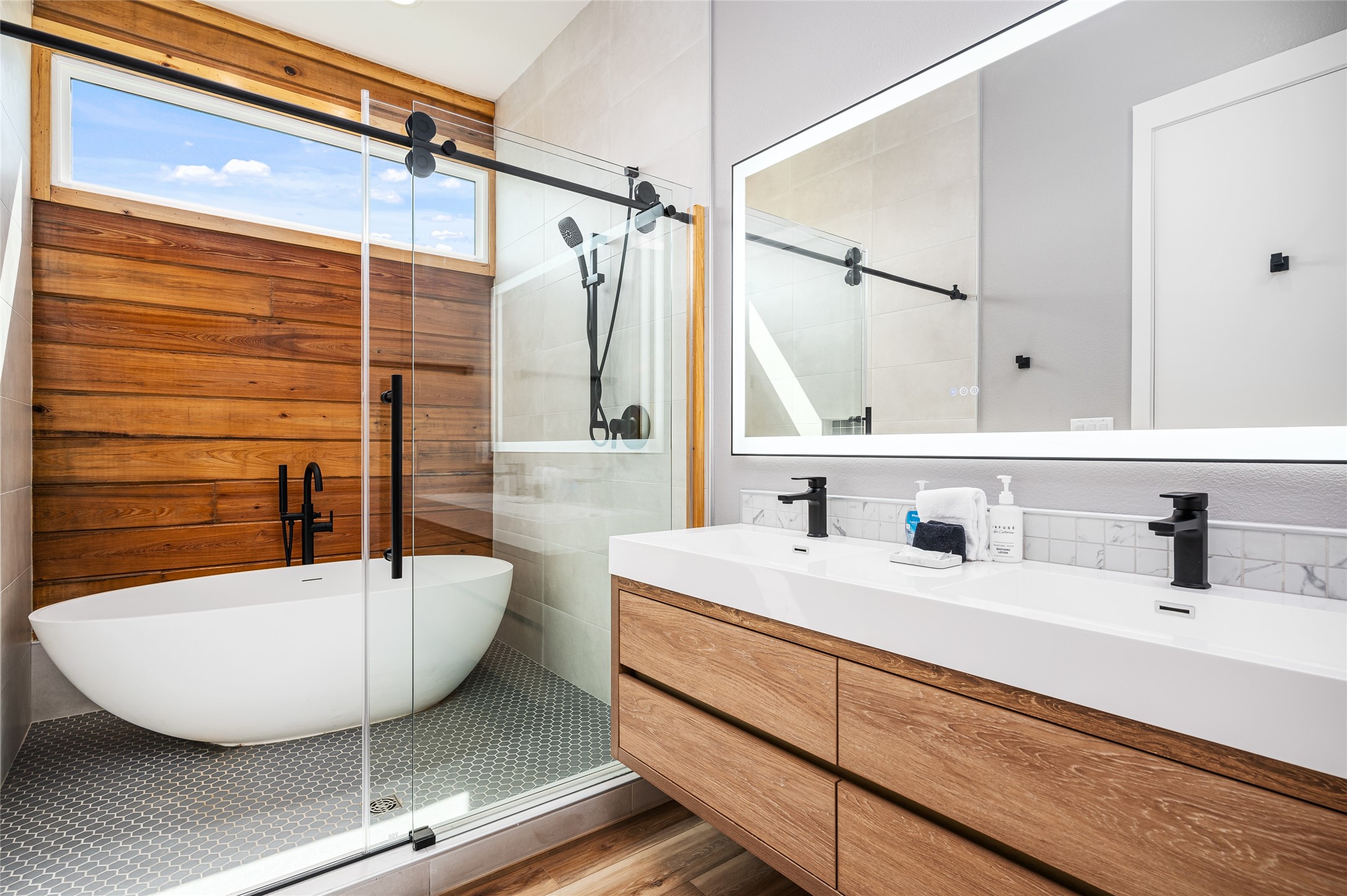 342 Atkinson Street Crystal Beach, TX 77650 - Photo 29 of 50 a bathroom with a sink and a mirror