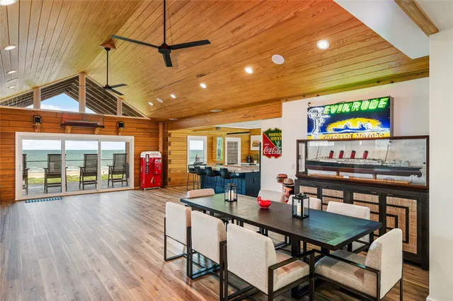 a dinning table and chairs in a room