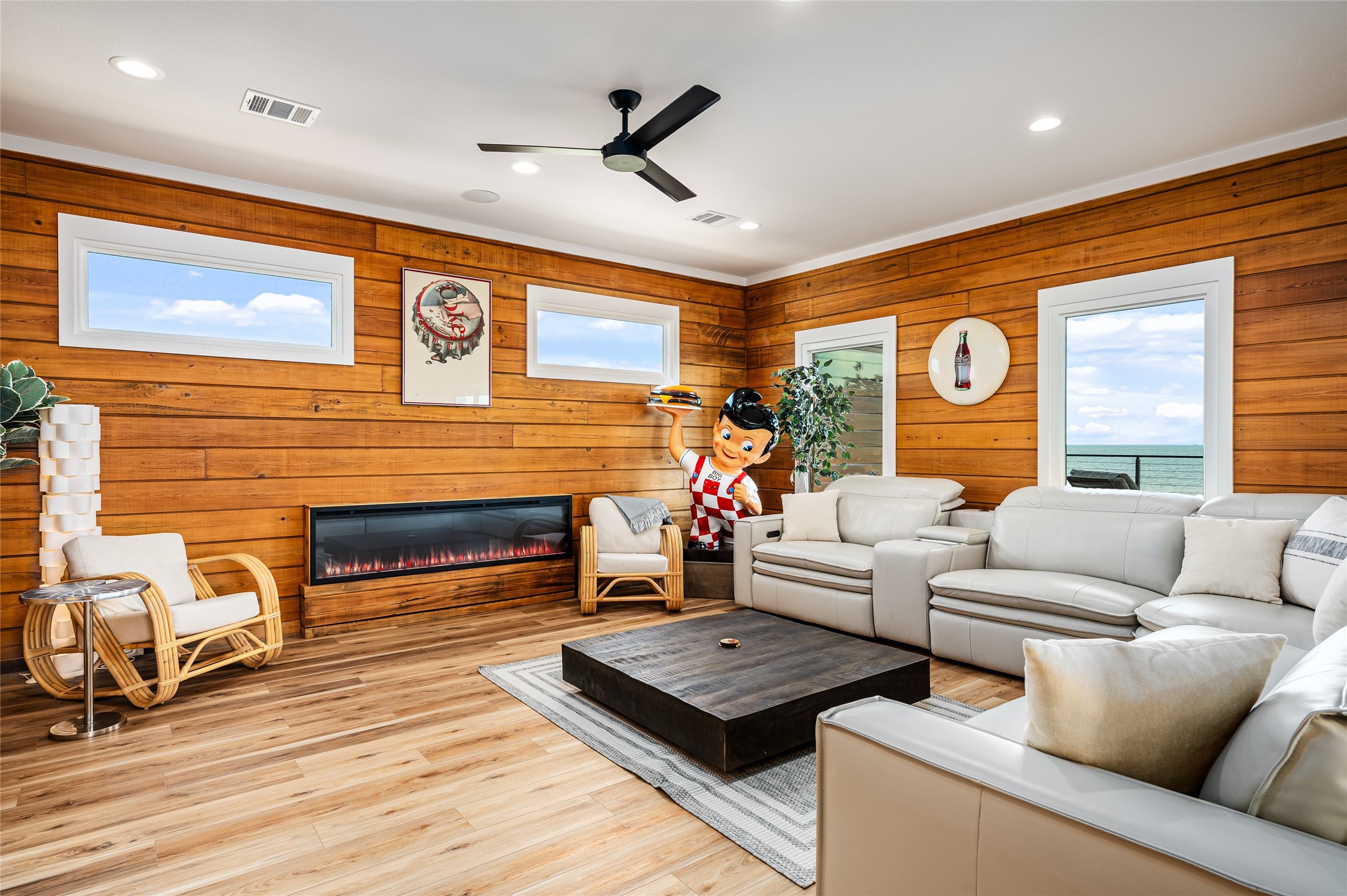 342 Atkinson Street Crystal Beach, TX 77650 - Photo 36 of 50 a living room with furniture and a fireplace