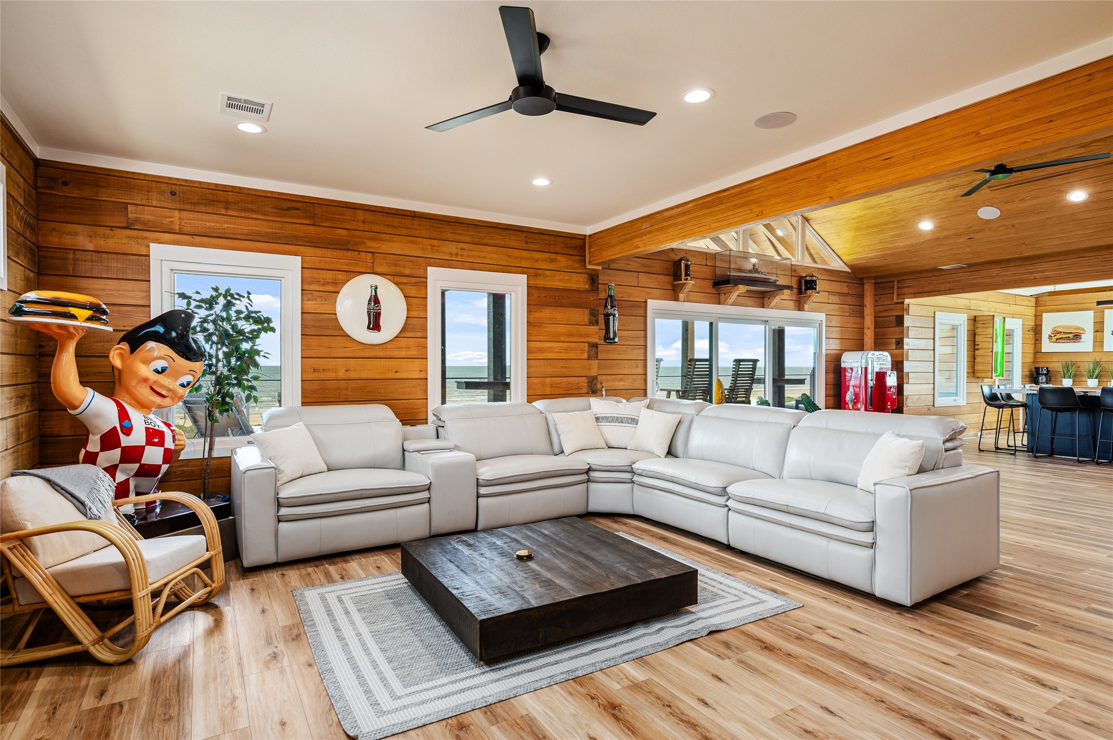 342 Atkinson Street Crystal Beach, TX 77650 - Photo 37 of 50 a living room with furniture ceiling fan and a rug