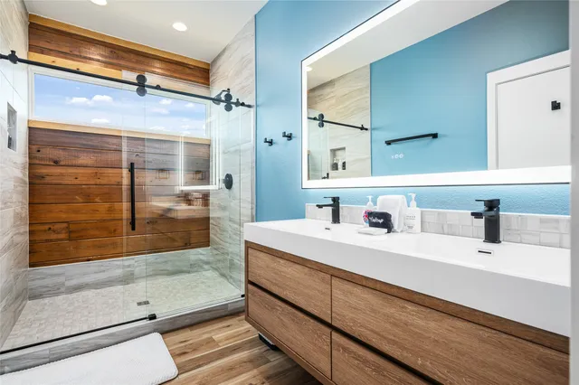 a bathroom with a sink and a mirror