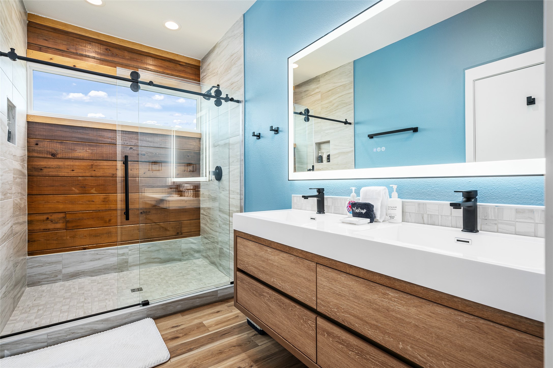 342 Atkinson Street Crystal Beach, TX 77650 - Photo 46 of 50 a bathroom with a sink and a mirror
