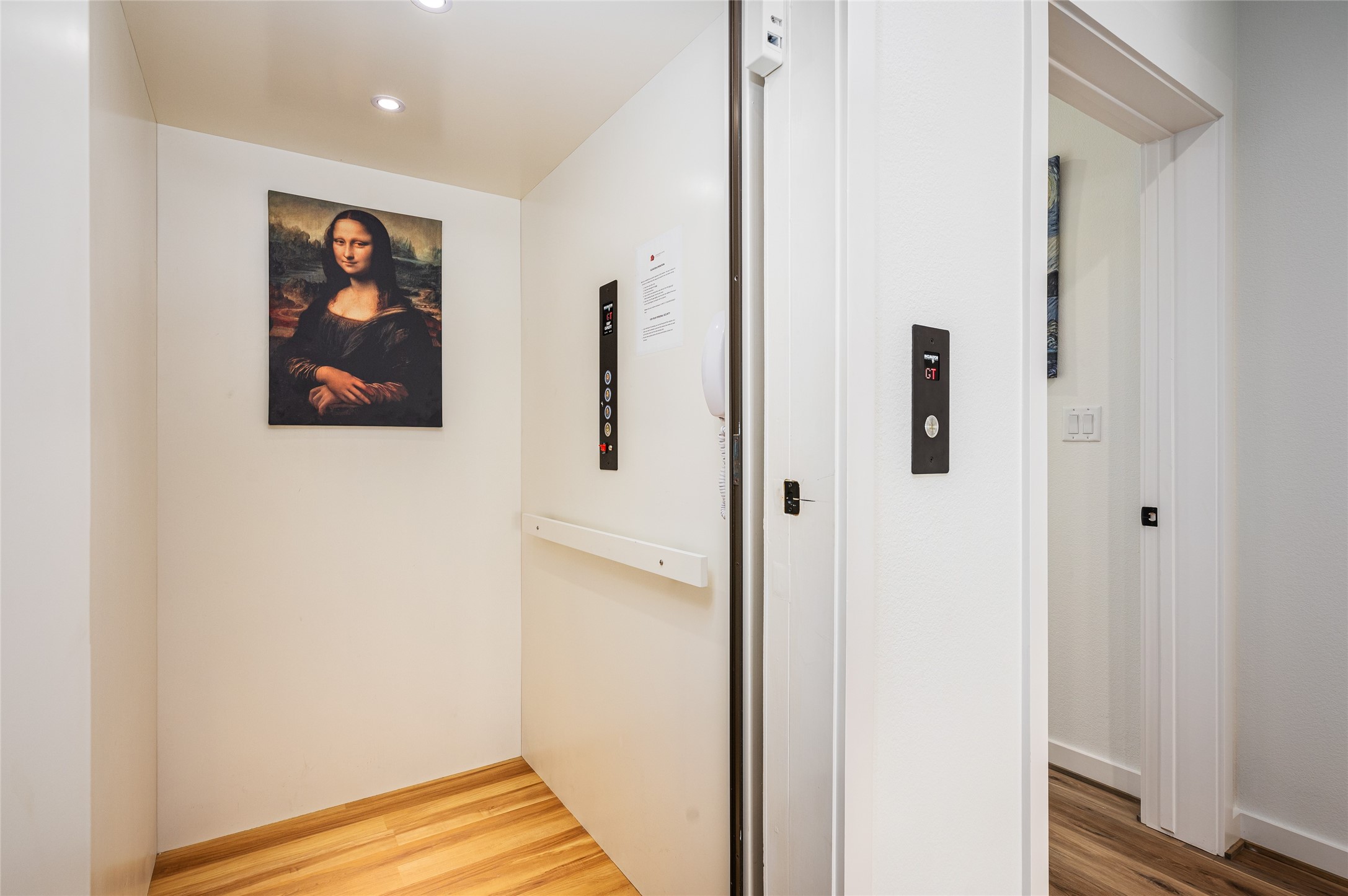 342 Atkinson Street Crystal Beach, TX 77650 - Photo 50 of 50 a view of a hallway with wooden floor