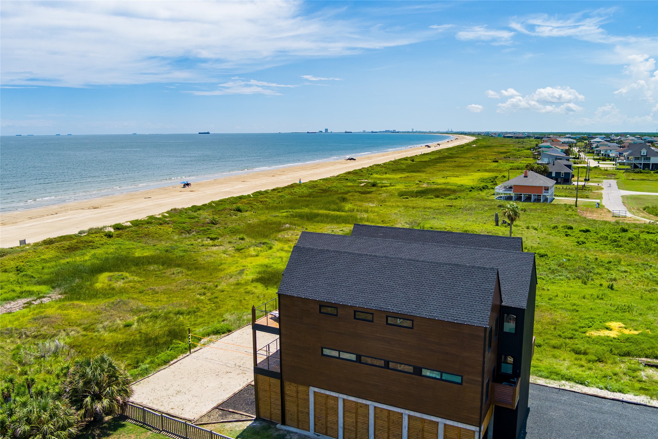 342 Atkinson Street Crystal Beach, TX 77650 - Photo 8 of 50 a view of a yard with an ocean