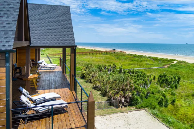 a view of swimming pool from a balcony