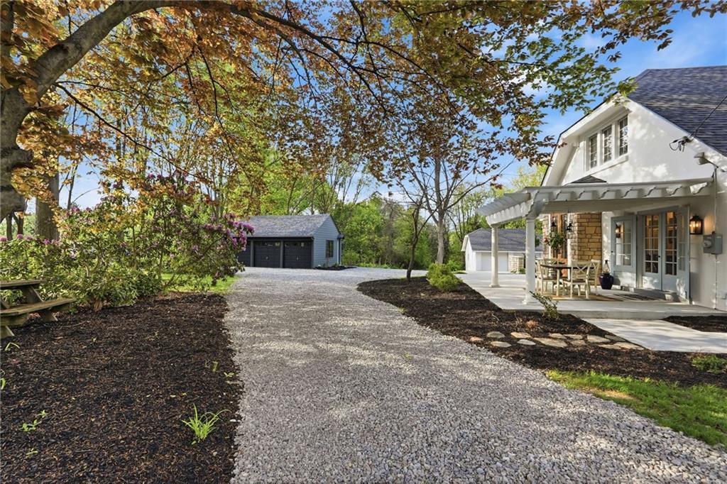 3944 Bakerstown Road Gibsonia, PA 15044 - Photo 2 of 50 a front view of a house with garden