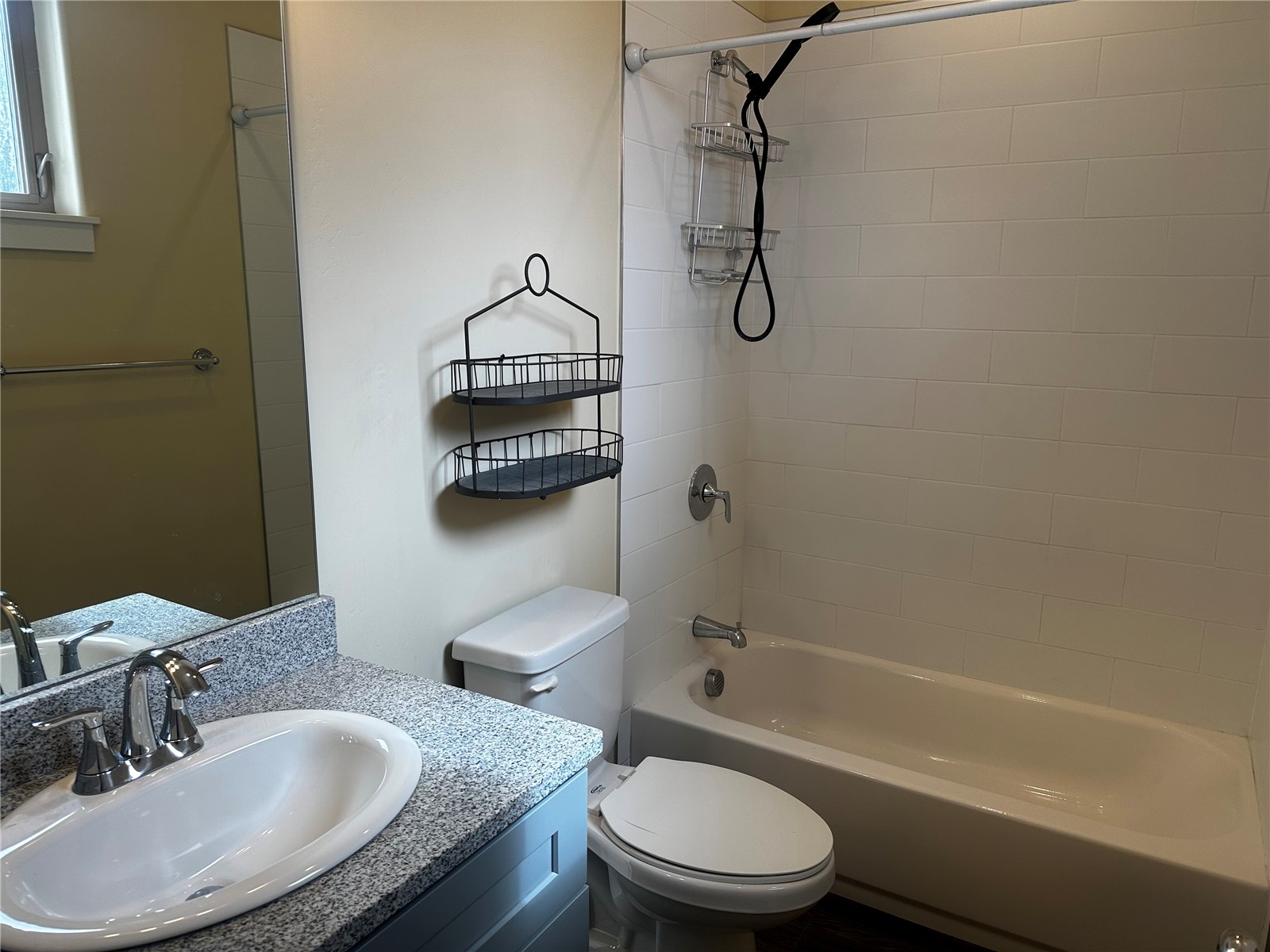 141 Wayback Drive, Unit B Keystone, CO 80435 - Photo 10 of 16 a bathroom with a granite countertop toilet sink and shower