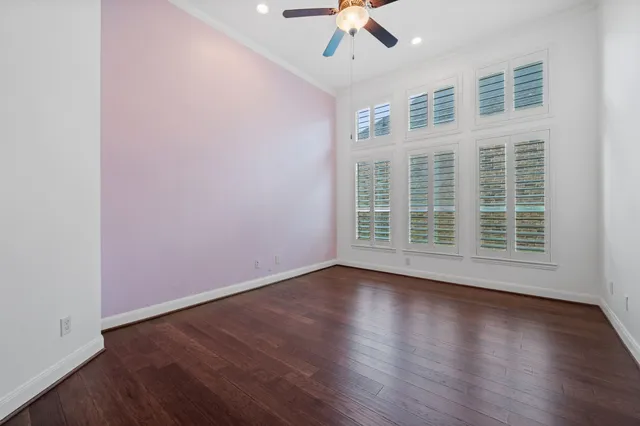 a view of livingroom with hardwood floor and ceiling fan