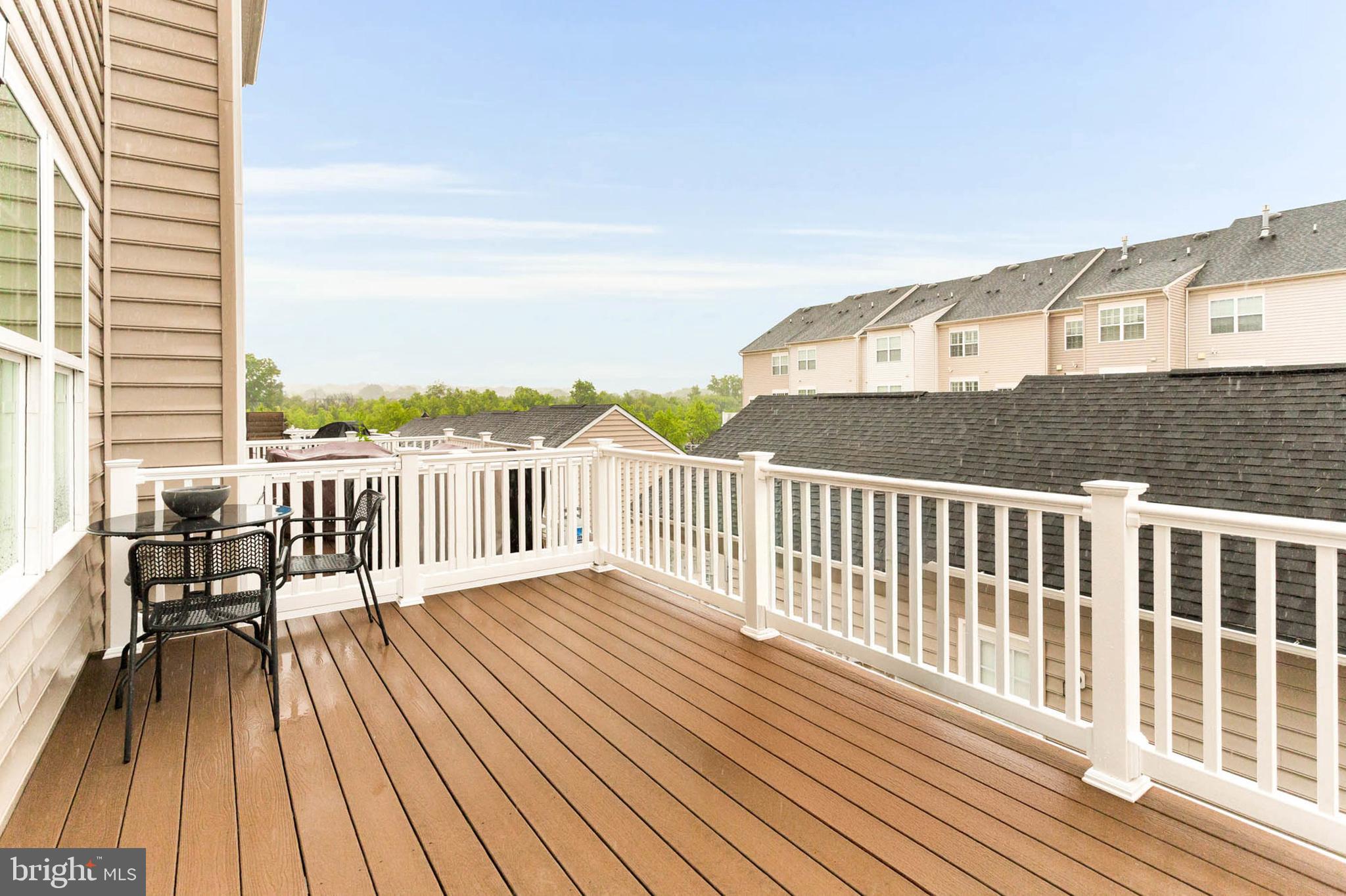 6367 Walcott Lane Frederick, MD 21703 - Photo 14 of 43 a view of a balcony with wooden floor