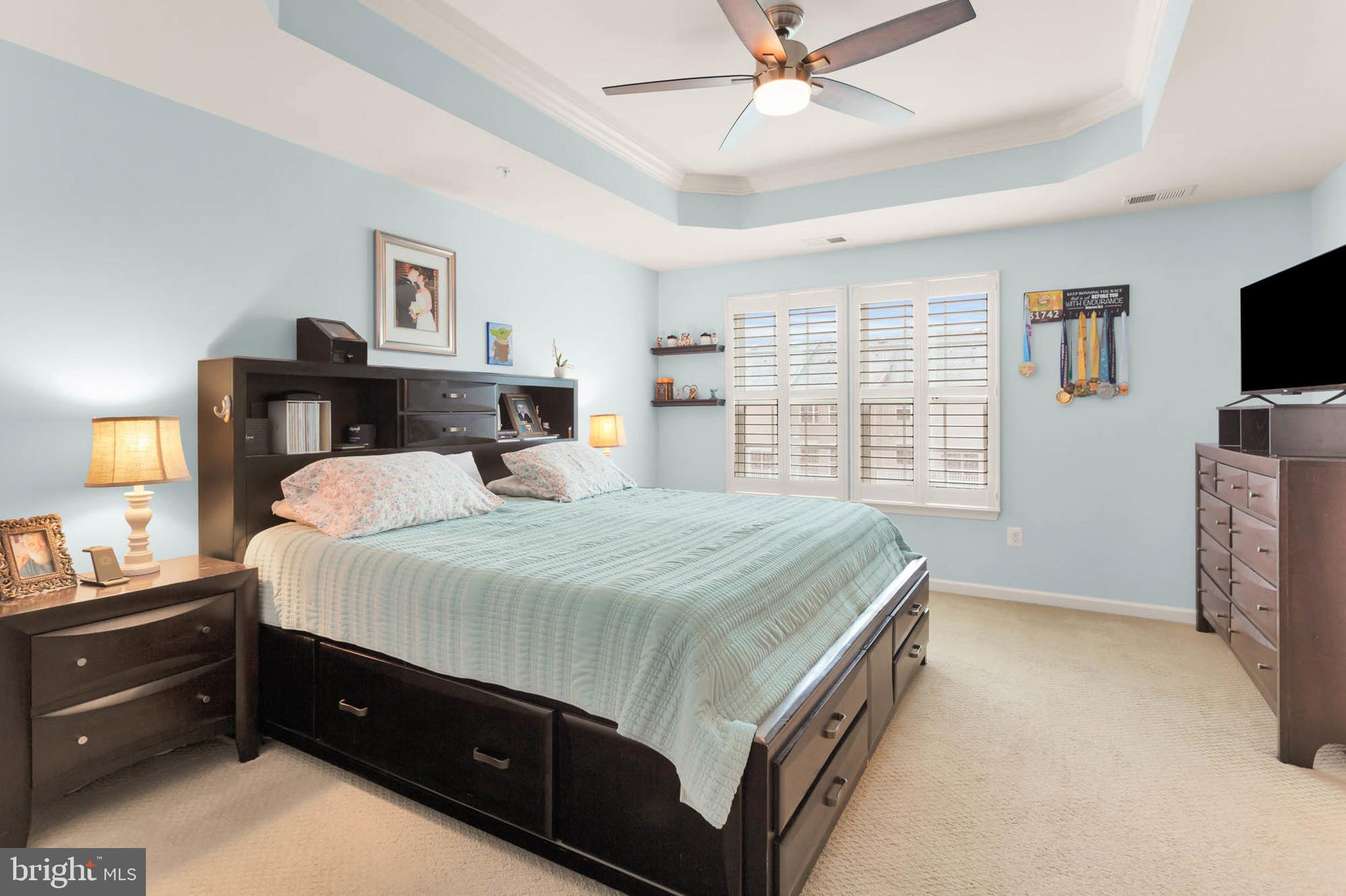 6367 Walcott Lane Frederick, MD 21703 - Photo 16 of 43 a bed room with a bed and a tv