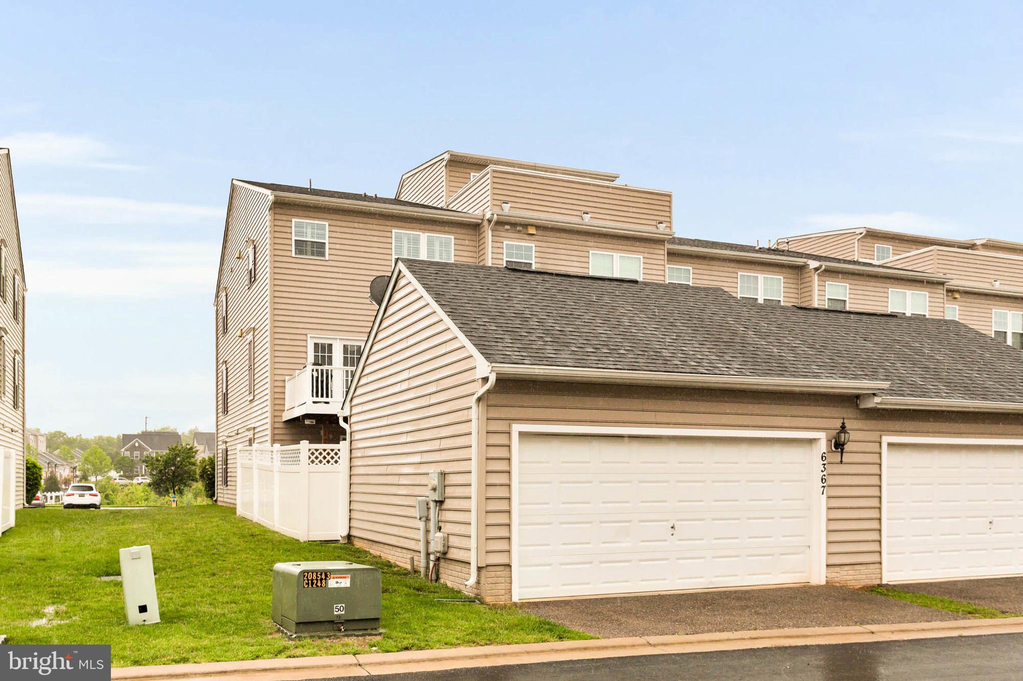 6367 Walcott Lane Frederick, MD 21703 - Photo 2 of 43 a view of a house with a yard