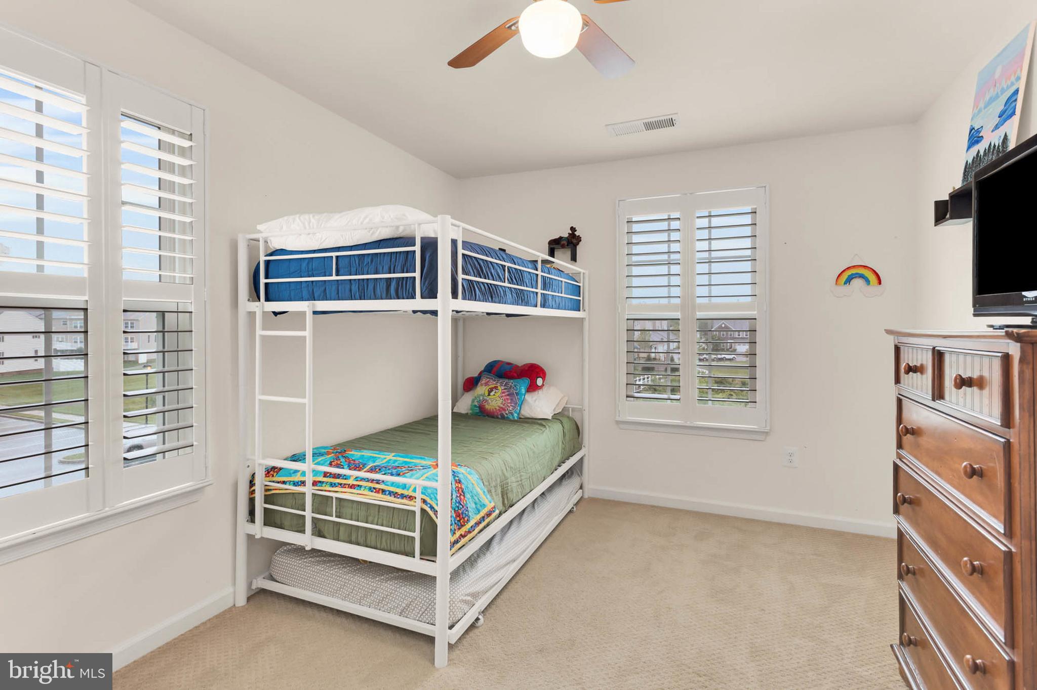 6367 Walcott Lane Frederick, MD 21703 - Photo 22 of 43 a bedroom with furniture and a window