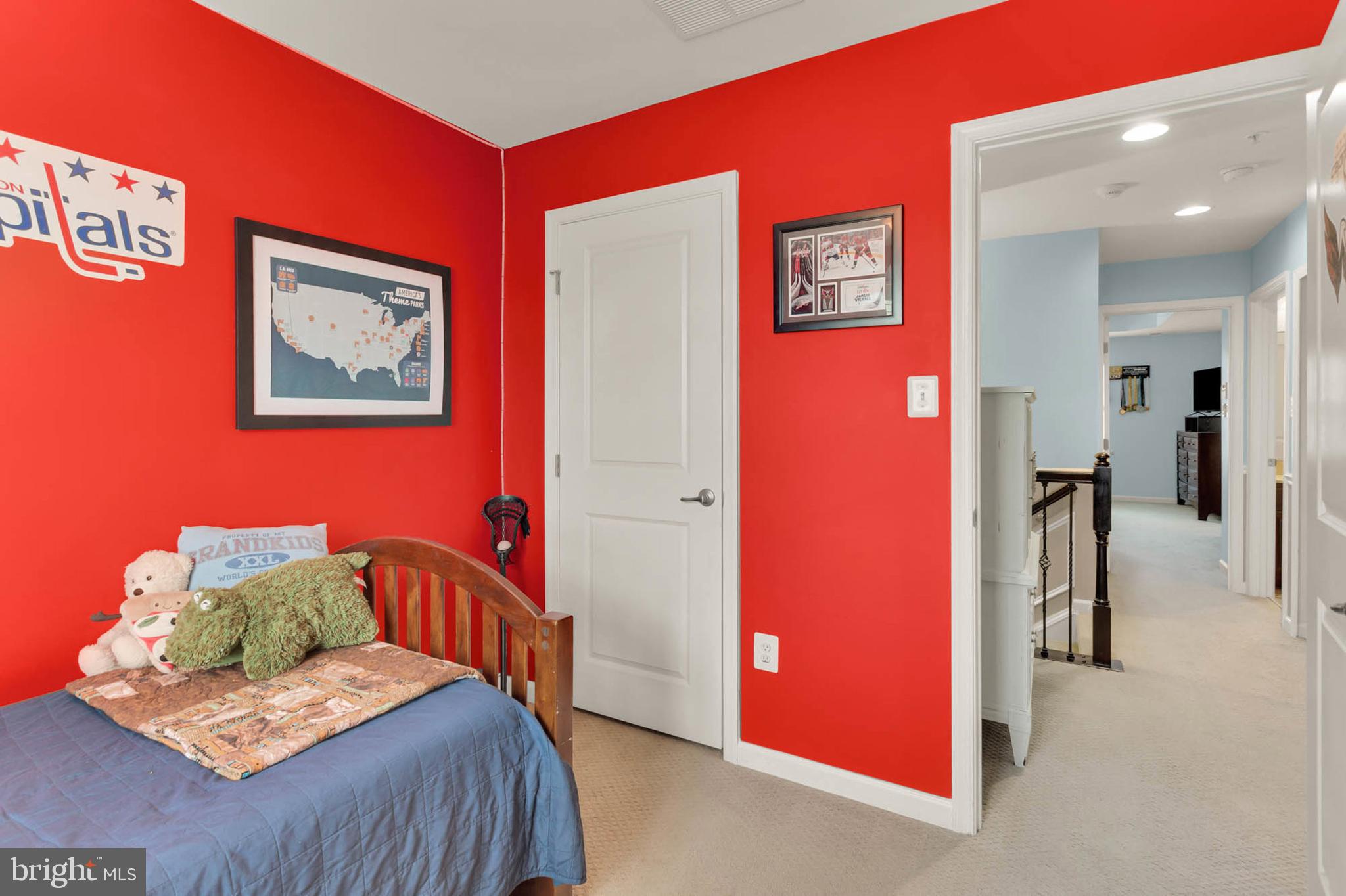 6367 Walcott Lane Frederick, MD 21703 - Photo 26 of 43 a bedroom with furniture and a gallery