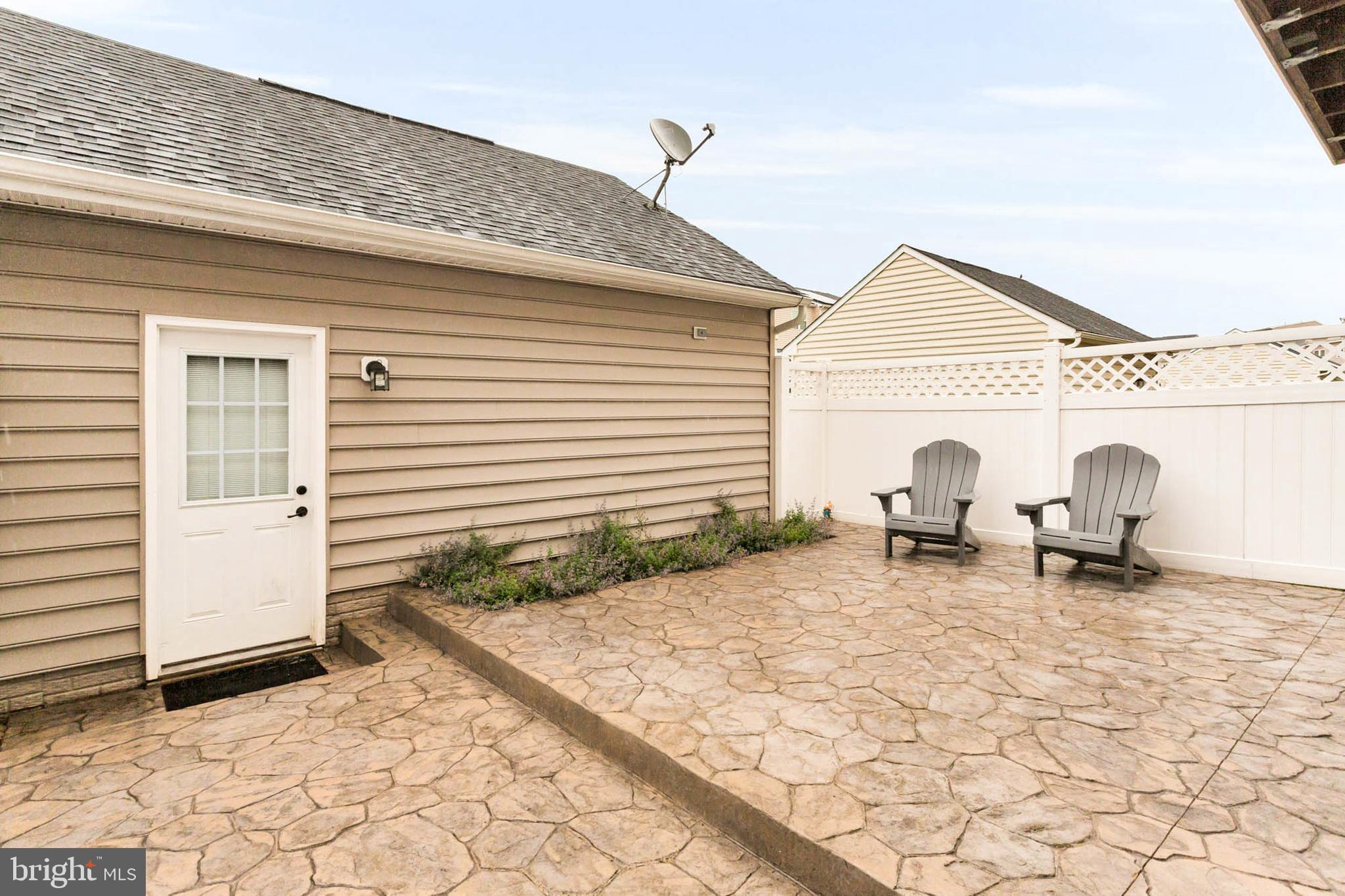 6367 Walcott Lane Frederick, MD 21703 - Photo 34 of 43 a view of a outdoor space with a patio