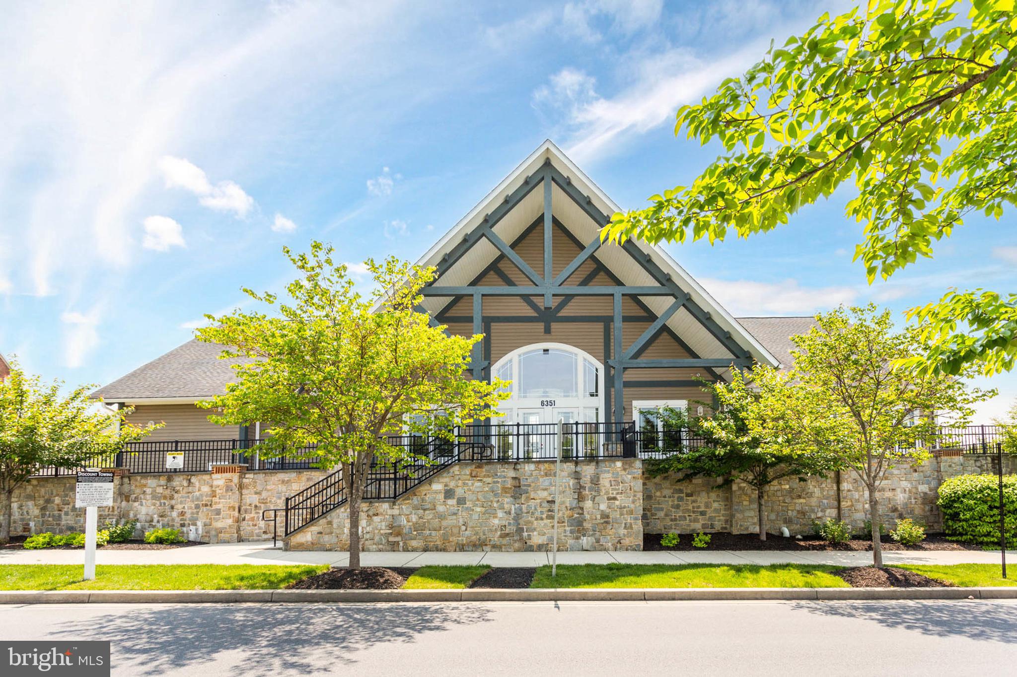 6367 Walcott Lane Frederick, MD 21703 - Photo 37 of 43 a view of swimming pool with palm trees