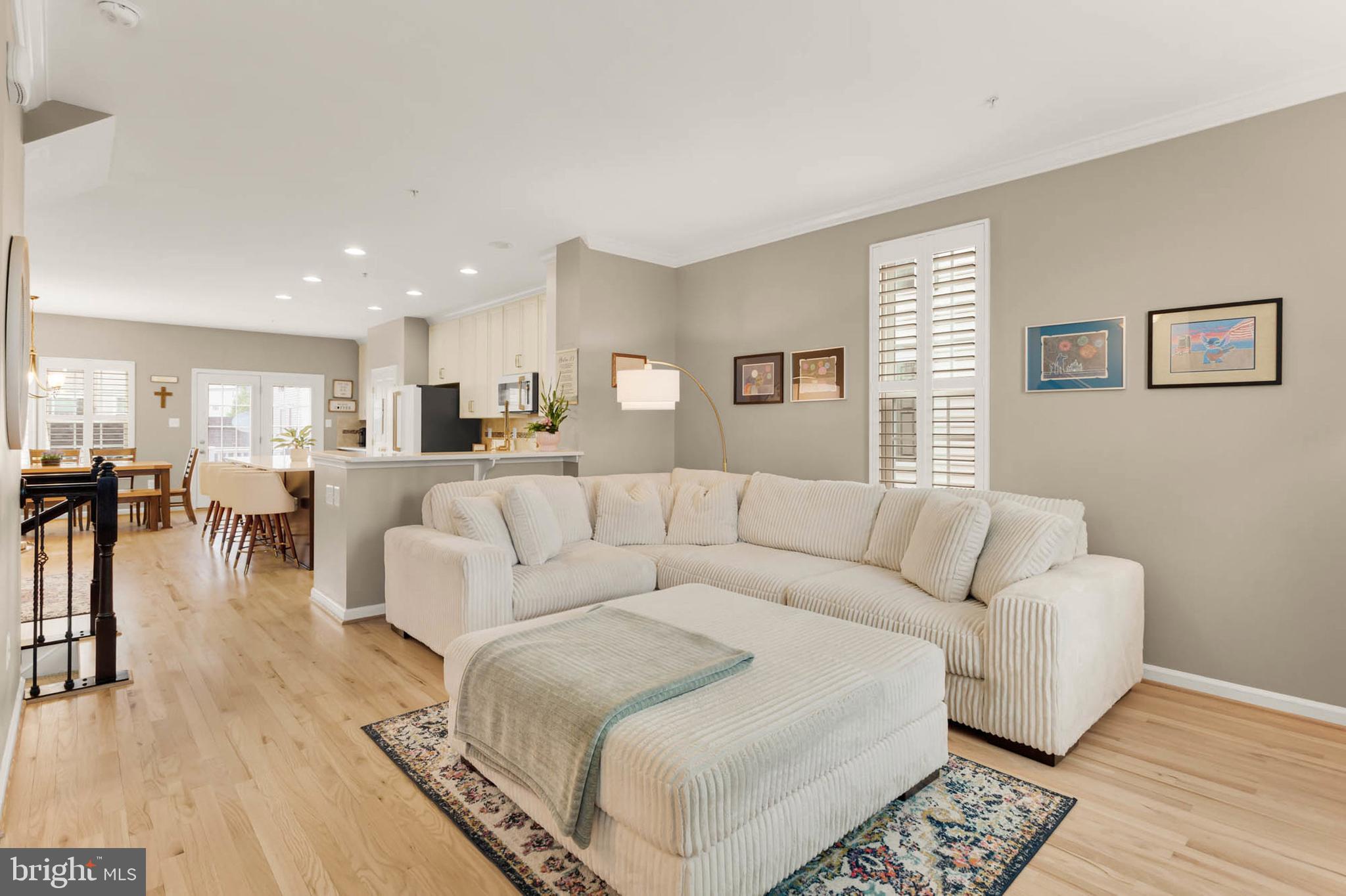 6367 Walcott Lane Frederick, MD 21703 - Photo 4 of 43 a living room with furniture and a wooden floor