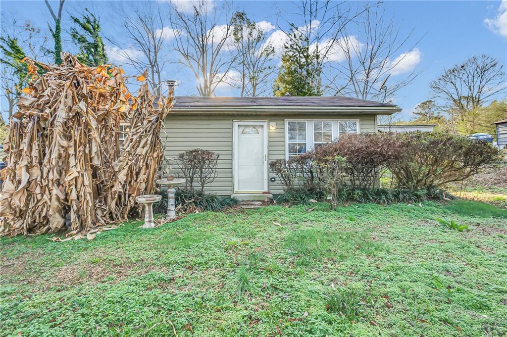 front view of house with a yard