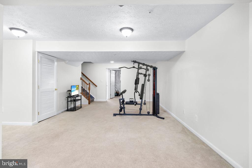 8605 Accokeek Street Laurel, MD 20724 - Photo 36 of 44 a view of a room with gym equipment