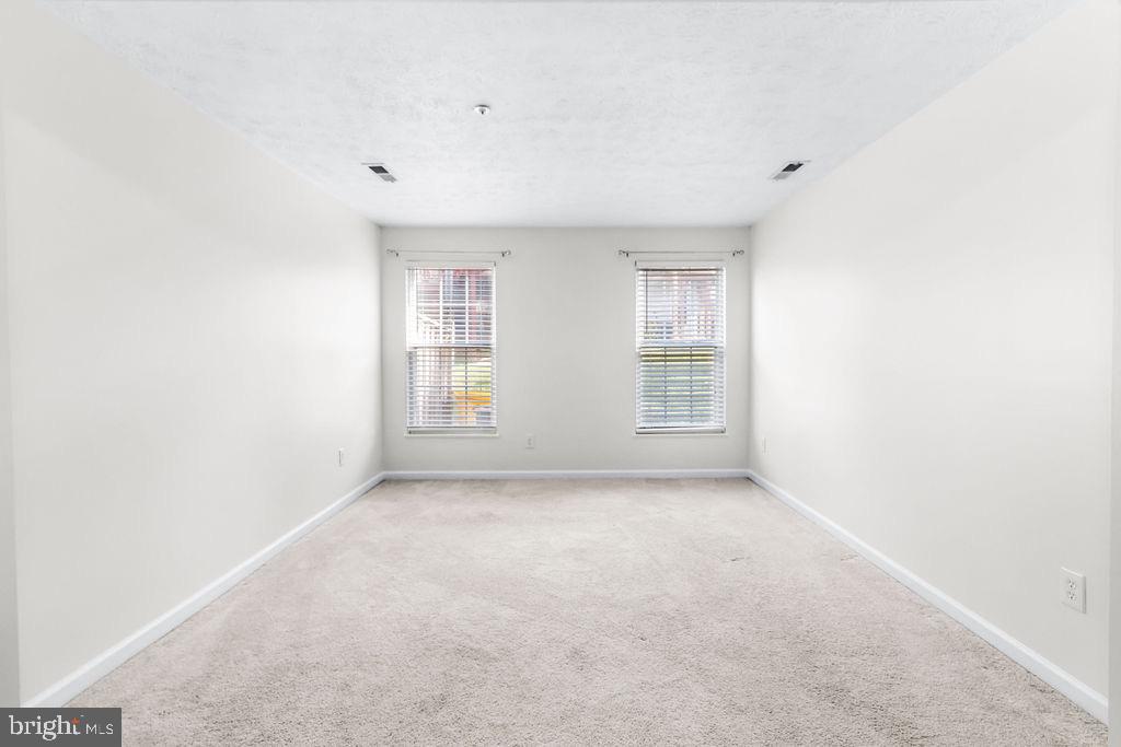 8605 Accokeek Street Laurel, MD 20724 - Photo 38 of 44 an empty room with windows