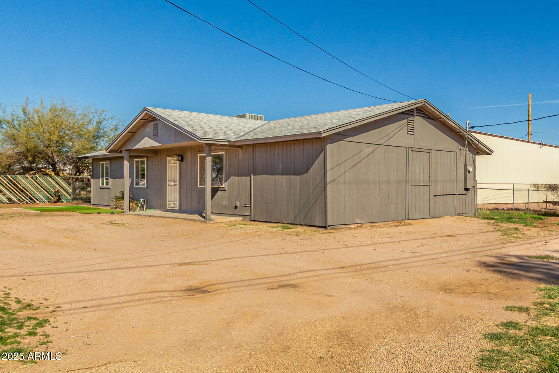 301 South Elmont Drive Apache Junction, AZ 85120 - Photo 27 of 32 a house with a outdoor space
