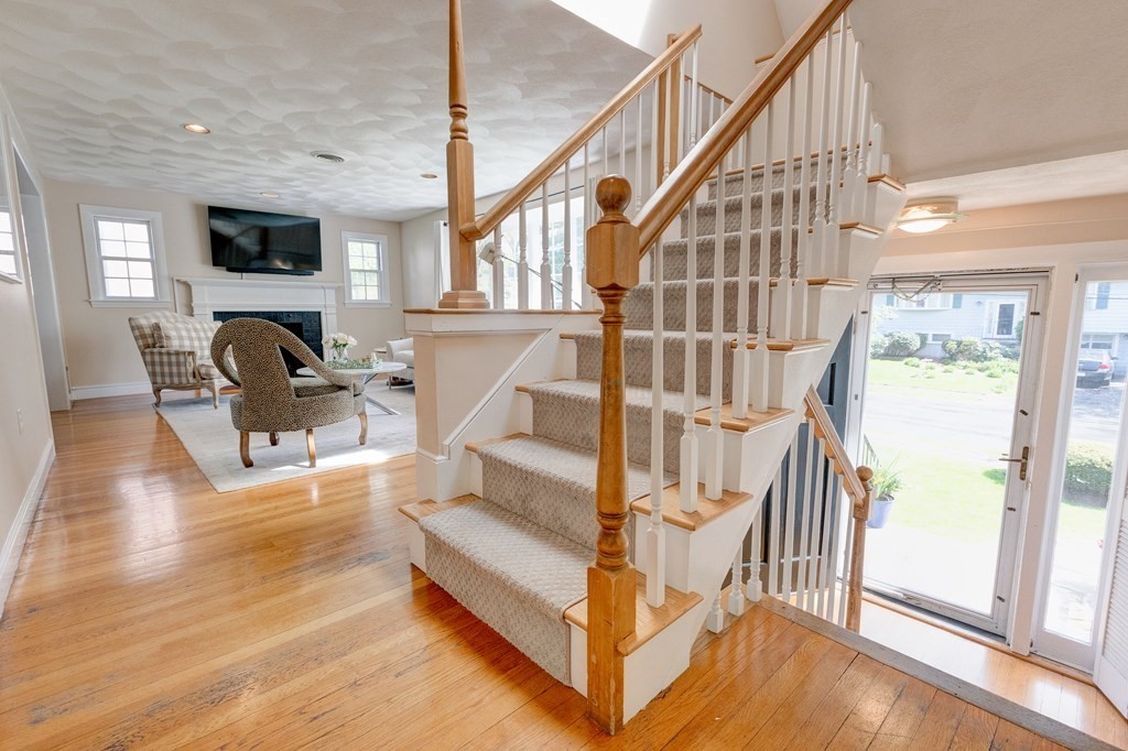 23 Bonwood Road Needham, MA 02492 - Photo 4 of 28 a view of entryway livingroom and hall with wooden floor