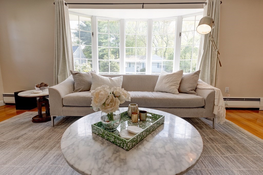 23 Bonwood Road Needham, MA 02492 - Photo 6 of 28 a living room with furniture and a large window
