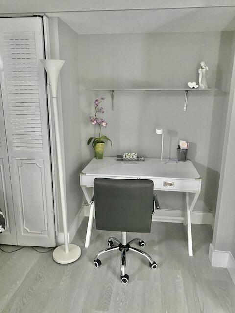 6461 Northwest 2nd Avenue, Unit 409 Boca Raton, FL 33487 - Photo 14 of 61 a work room with a table and chairs