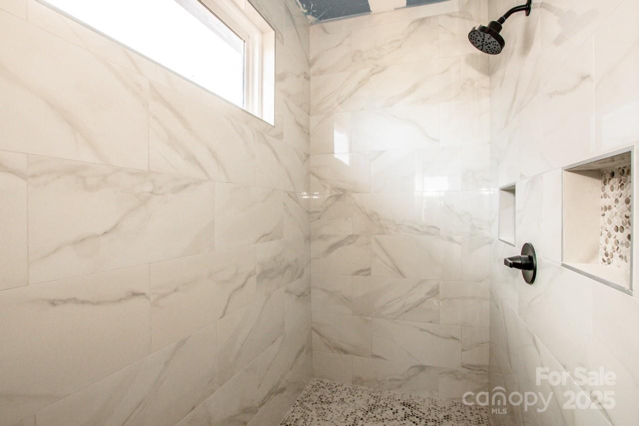 6098 Ballard Road Denver, NC 28037 - Photo 34 of 48 a bathroom with a shower