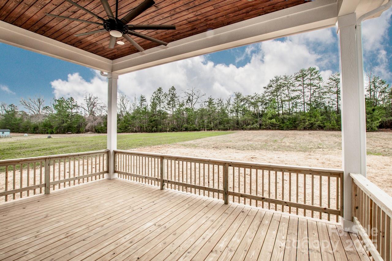 6098 Ballard Road Denver, NC 28037 - Photo 40 of 48 a view of a wooden deck