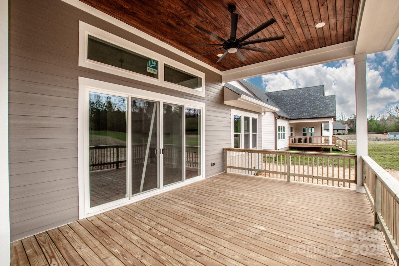 6098 Ballard Road Denver, NC 28037 - Photo 43 of 48 a view of a house with a balcony