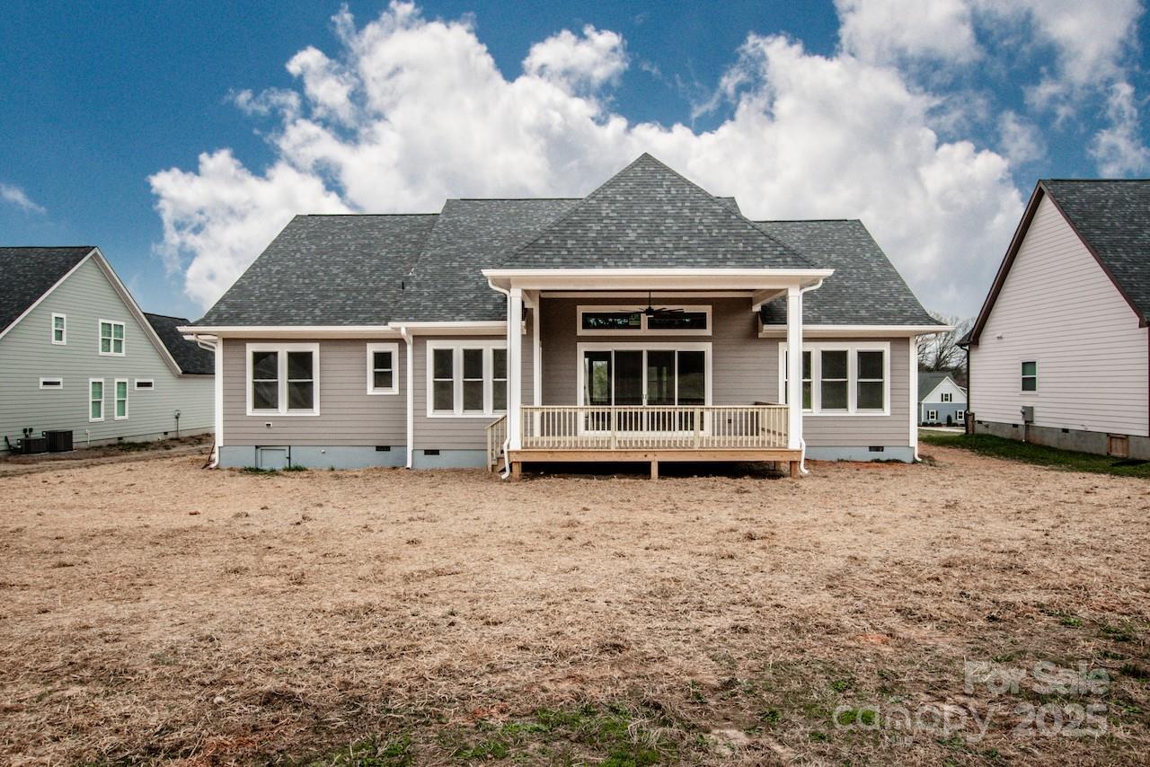 6098 Ballard Road Denver, NC 28037 - Photo 44 of 48 a house with trees in the background