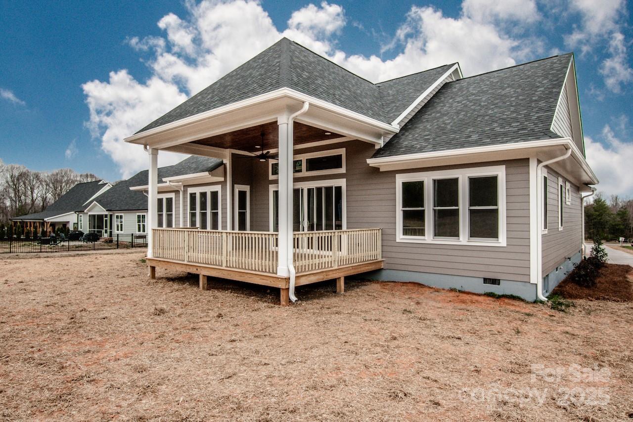 6098 Ballard Road Denver, NC 28037 - Photo 48 of 48 a view of a house with a yard