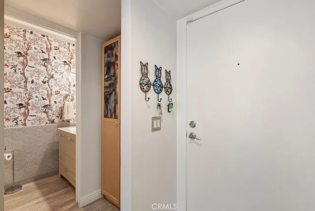 a bathroom with a shower and a window