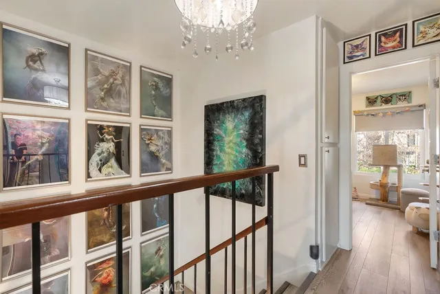 a view of a balcony with wooden floor