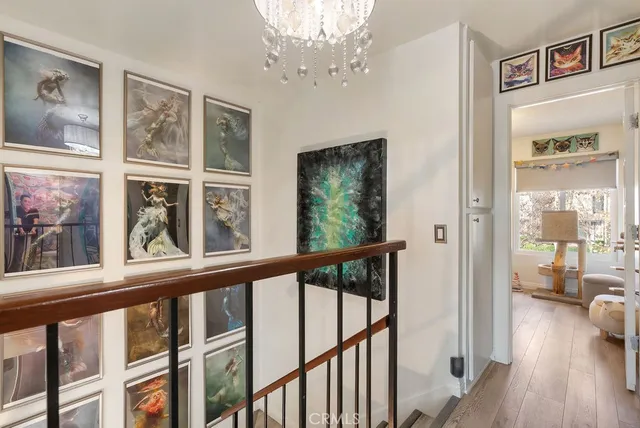 a view of a balcony with wooden floor