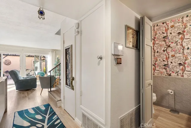 a view of livingroom with furniture and wooden floor