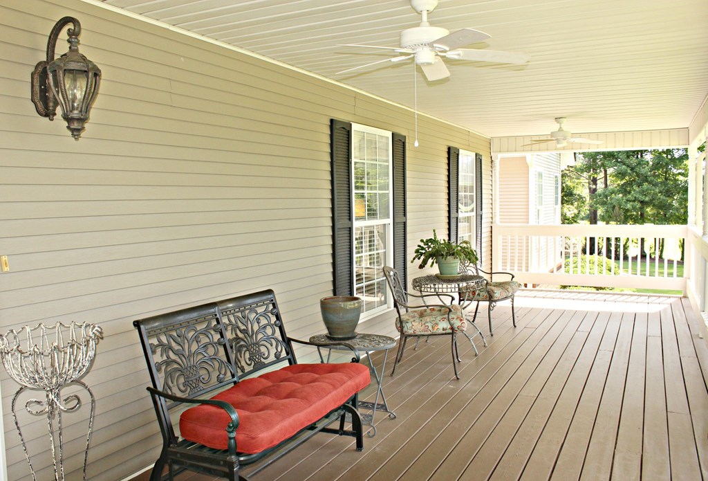 1397 Jenkins Road, Unit 2 Forsyth, GA 31029 - Photo 8 of 11 a living room with furniture a window and a table